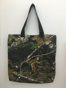 For those who like hunting or to just be in the wild, here is your camouflage handmade tote bag! All materials are 100% cotton, from the fabric, muslin lining, black trim, and thread. Machine wash normal, cold, mild detergent, no bleach, tumble dry low, cool iron. Measurements are around 16in x 19in x 4in.