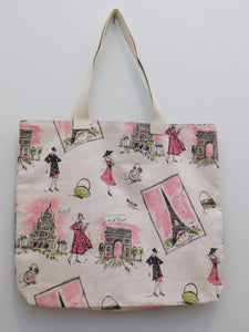 For the Paris theme lovers, here is a pink handmade Paris tote bag. This beautiful fabric illustrates the Eiffel Tower, Arc of Triomphe, Sacre-Coeur Basilica, ladies in pink, perfume bottle and purse. Fabric, thread and natural color are 100% cotton. The masurements are around 16in x 19in x 3in 