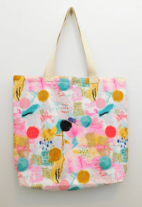 This handmade tote bag is full of color. It has splashes of pinks, with teal, black, gold, and red circles. Dark blue, pink, and teal dots and zigzag gold lines. The bag is a party in itself! The tote bag is 100% cotton, from the duck cloth, the muslin lining, the thread and trim. Machine wash gentle cold, non-chlorine bleach, tumble dry low, remove quickly, use a warm iron. Measurements are around 16in x 19in x 4in.  